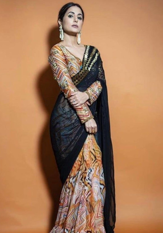 hina khan in black half and half saree